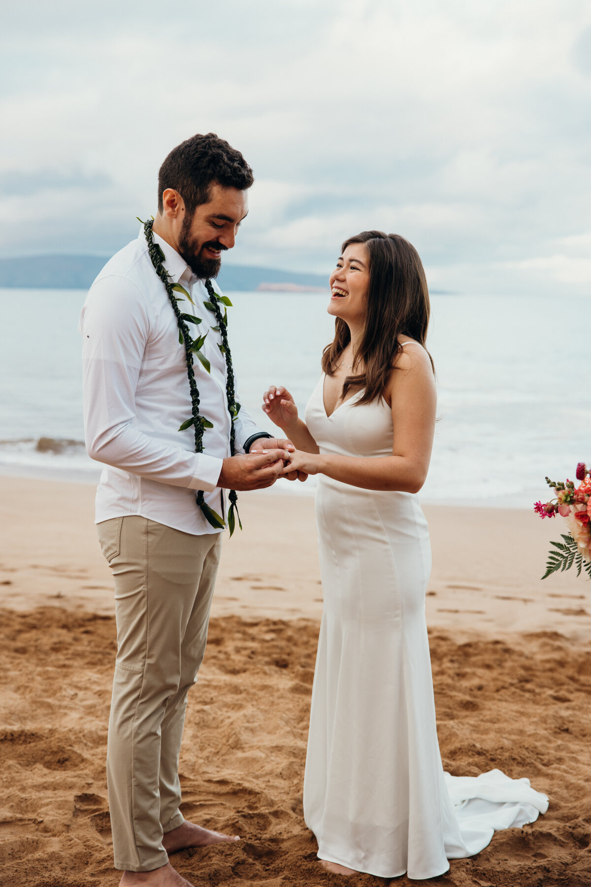 Maui Wedding Photographer captures bride laughing with groom