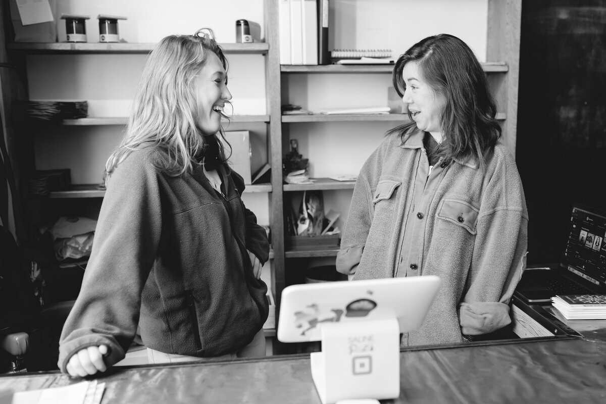black-and-white-retail-counter-workers