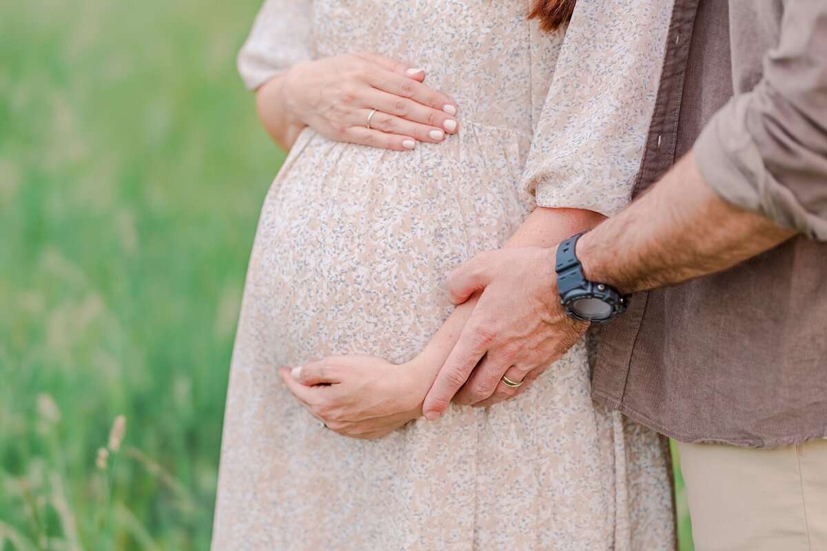 Maternity portraits in Harrisonburg, VA, capturing the anticipation of parenthood in a peaceful outdoor setting