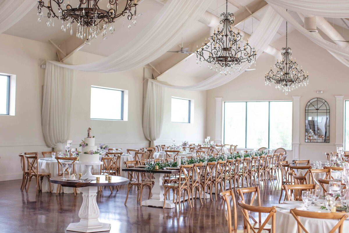 wedding venue with chandeliers and natural light by Texas photographer Firefly