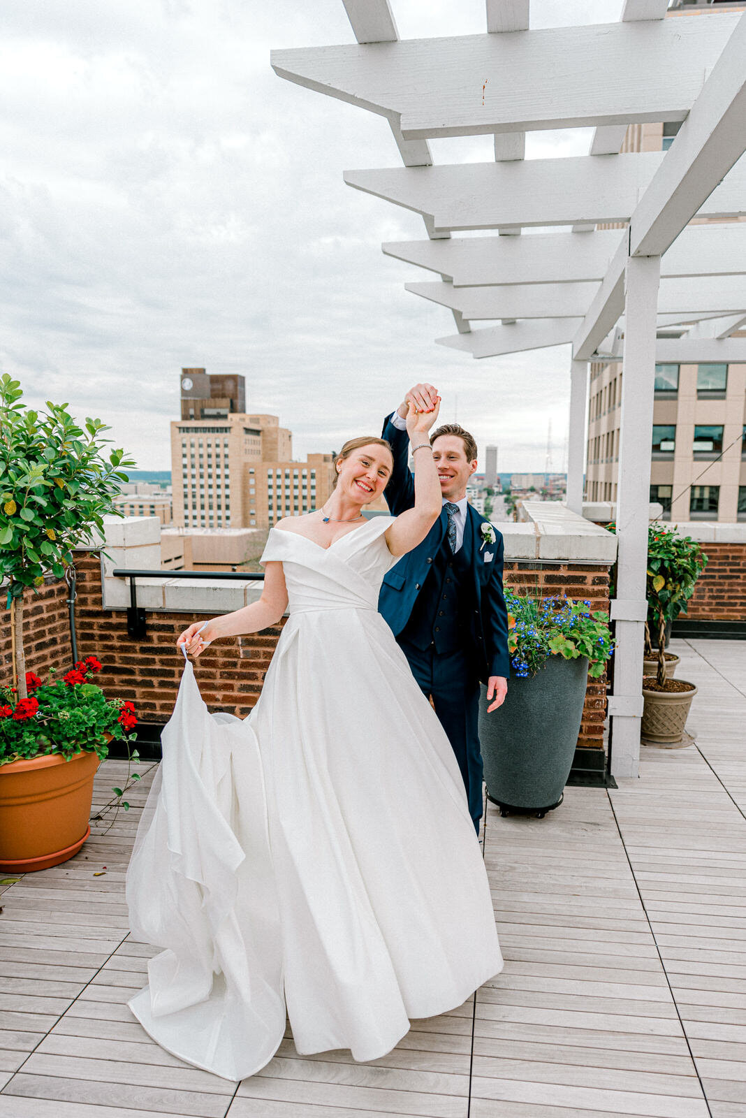 bride and groom downtown omaha rooftop