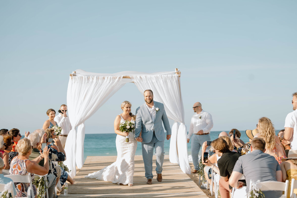 a bride and groom say their vows in Punta Cana