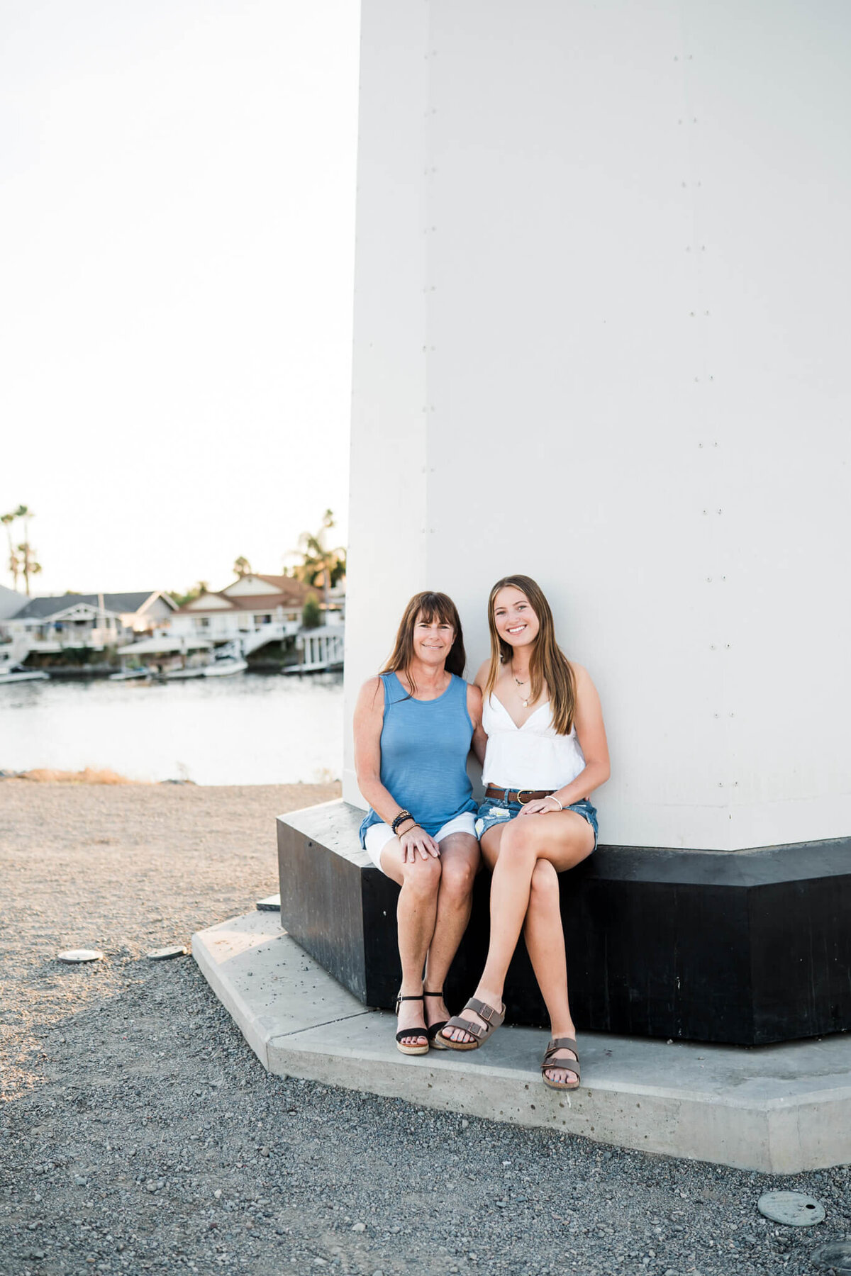 Family Looking at Each other on the Lake By Vanessa Montano |Brentwood Family Photographer