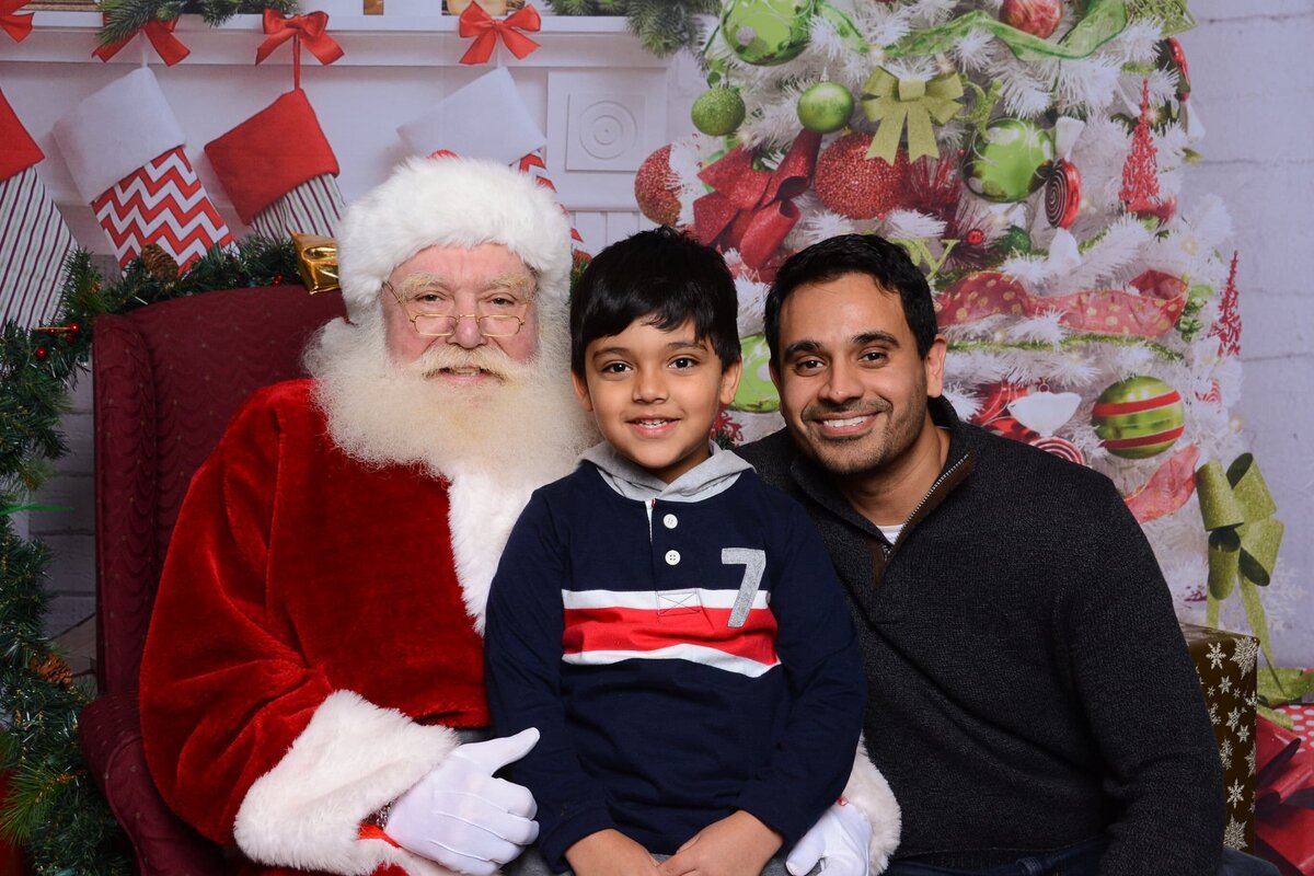 Family with Santa at a Toronto holiday party