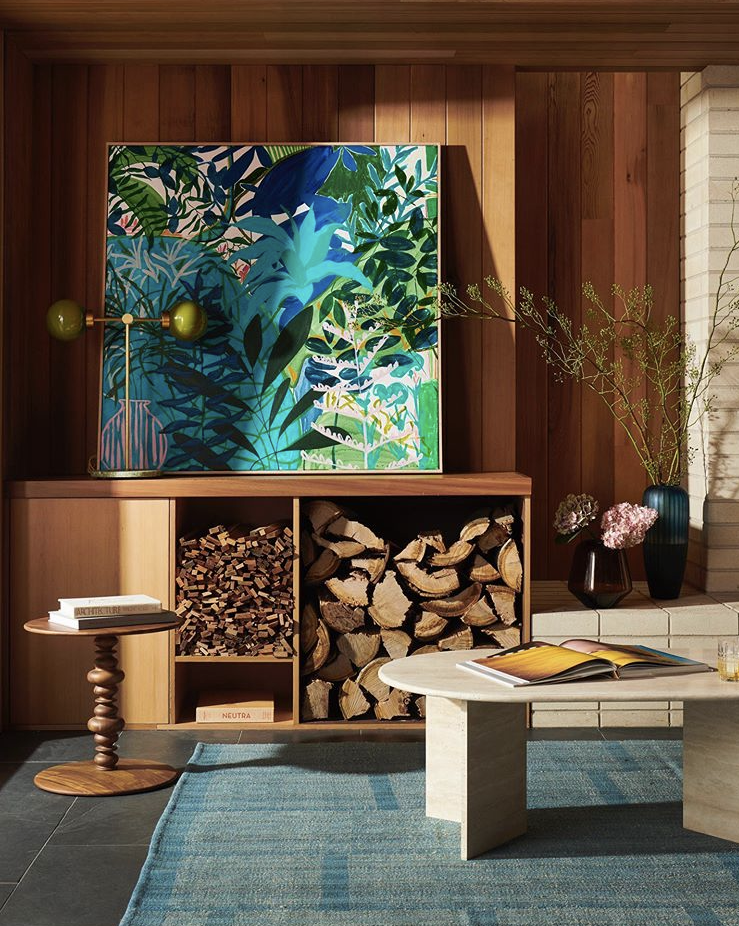 Large vibrant botanical artwork framed by timber cabinetry and soft lighting, styled by Melbourne interior design studio.