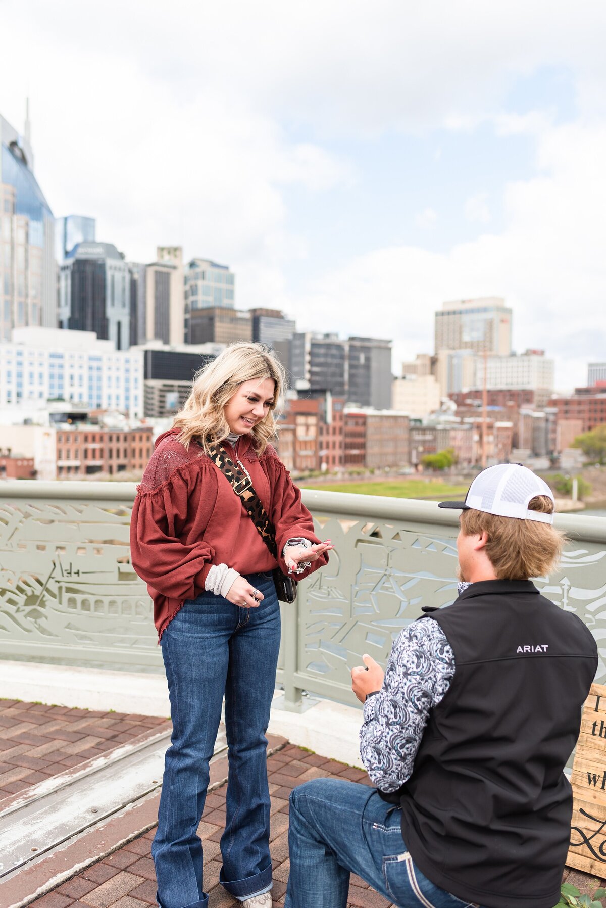 Surprise-proposal-photos-in-Downtown-Nashville-Pedestrian-Bridge+17