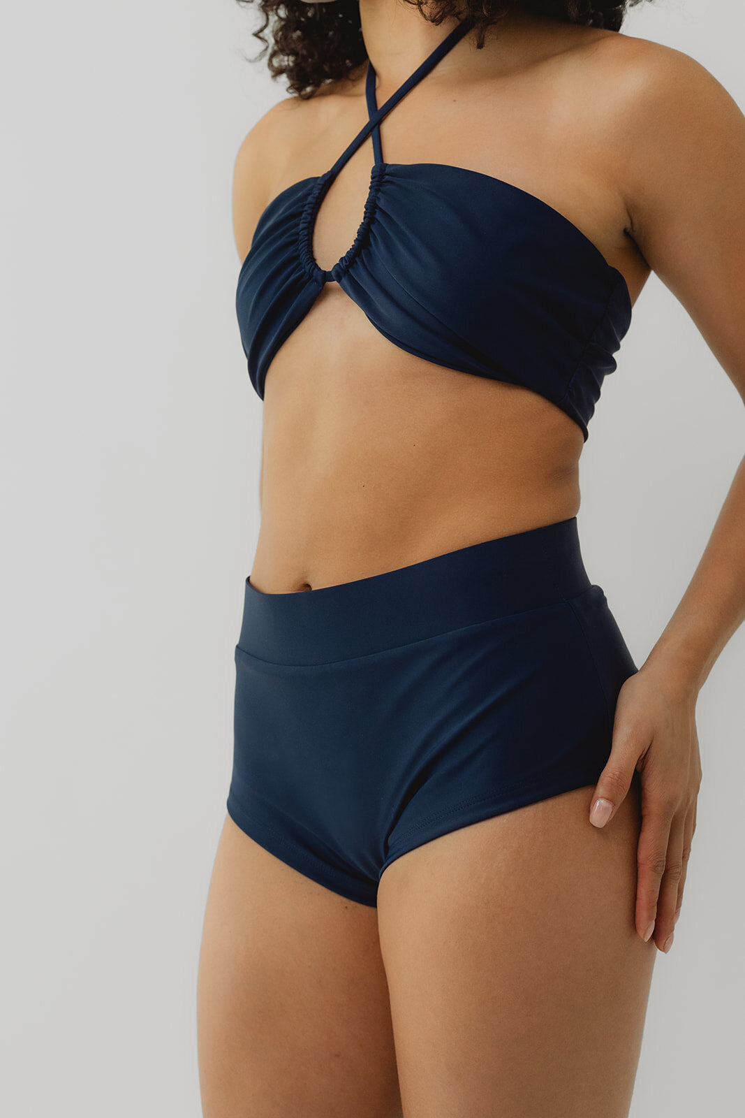 woman modeling sustainable swimwear
