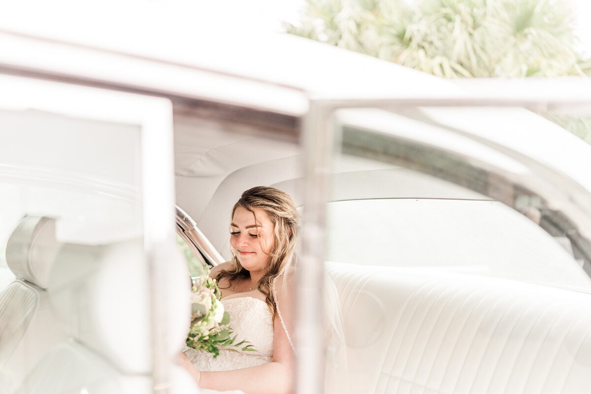 The-Grand-Wedding-Photographer-Videographer-Point-Clear-Fairhope-Alabama-Paige-Michael-Bride-Sitting-In-Vintage-Car