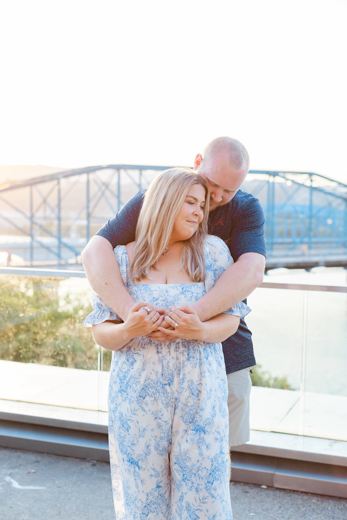 proposal session on a bridge overlooking downtown Chattanooga