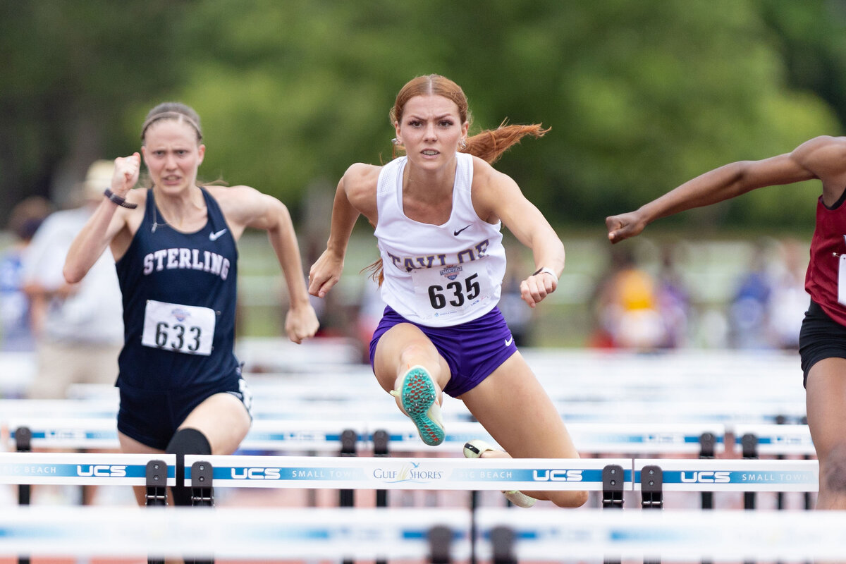 Taylor College athlete competes in the 110m hurdles at the National Championship held in Gulf Shores, Alabama.
