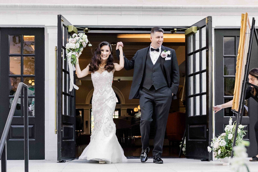 bride-and-groom-entering-reception-the-guild-hotel-san-diego-wedding