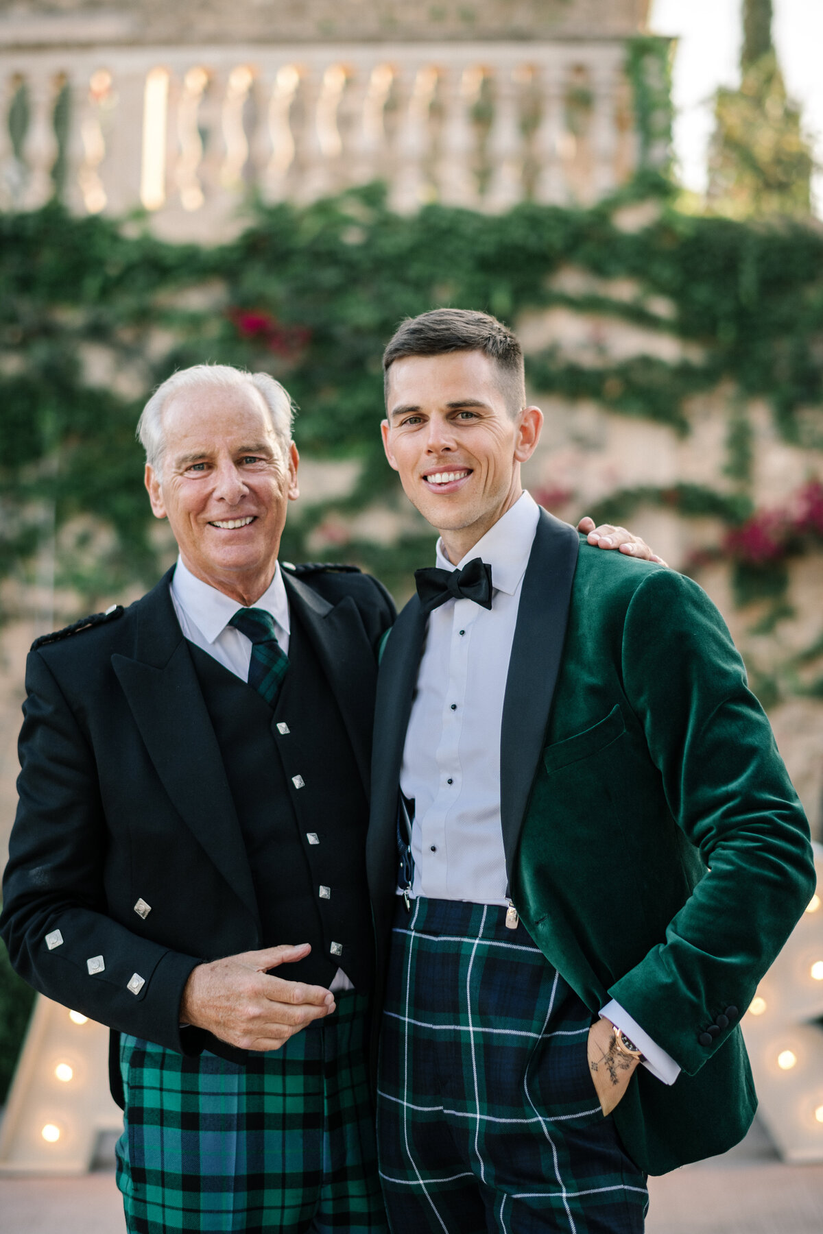 scottish groom and father of the groom in green and black tartan
