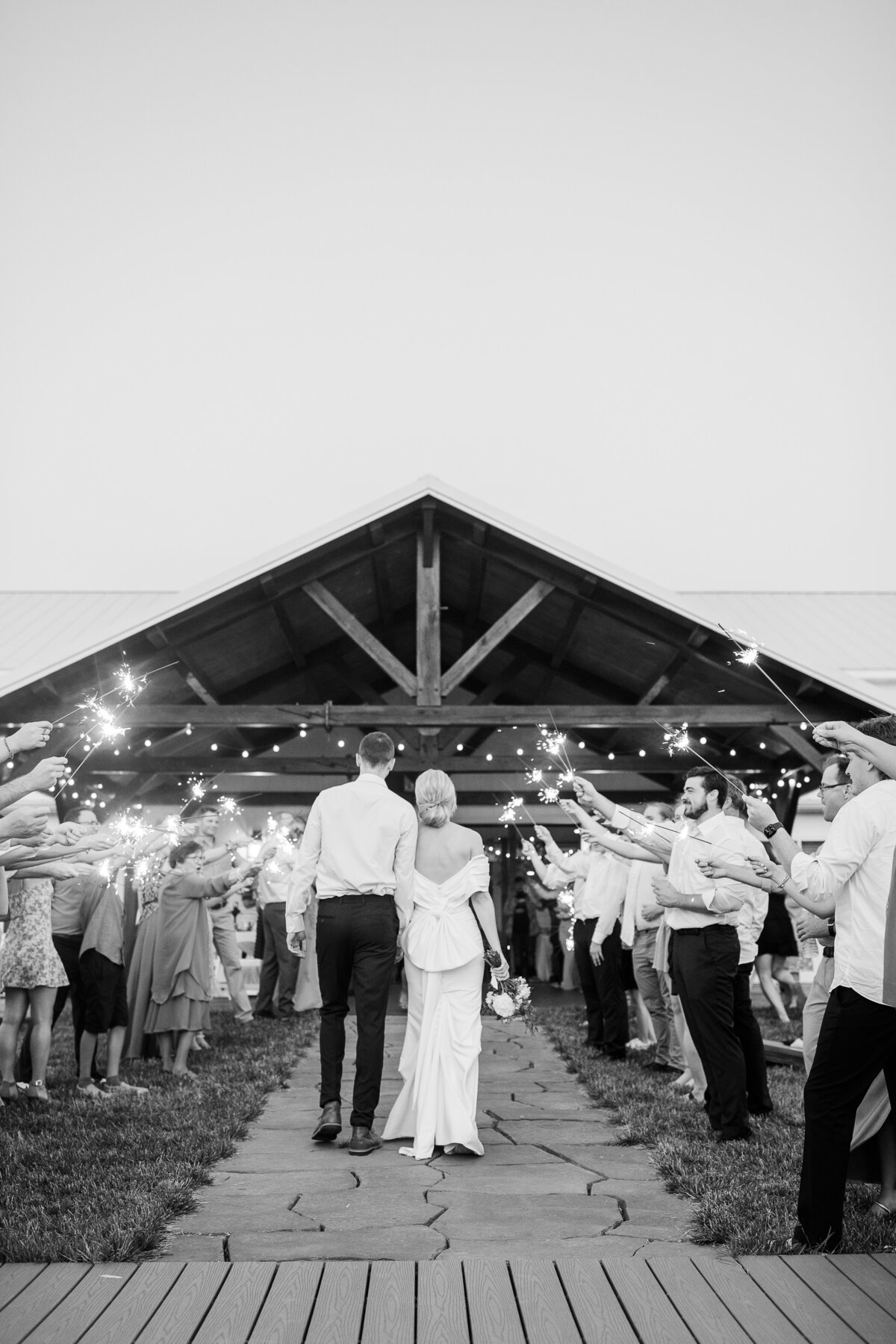 Sparkler exit photos at Emerson Fields Wedding venue in Excello Mo