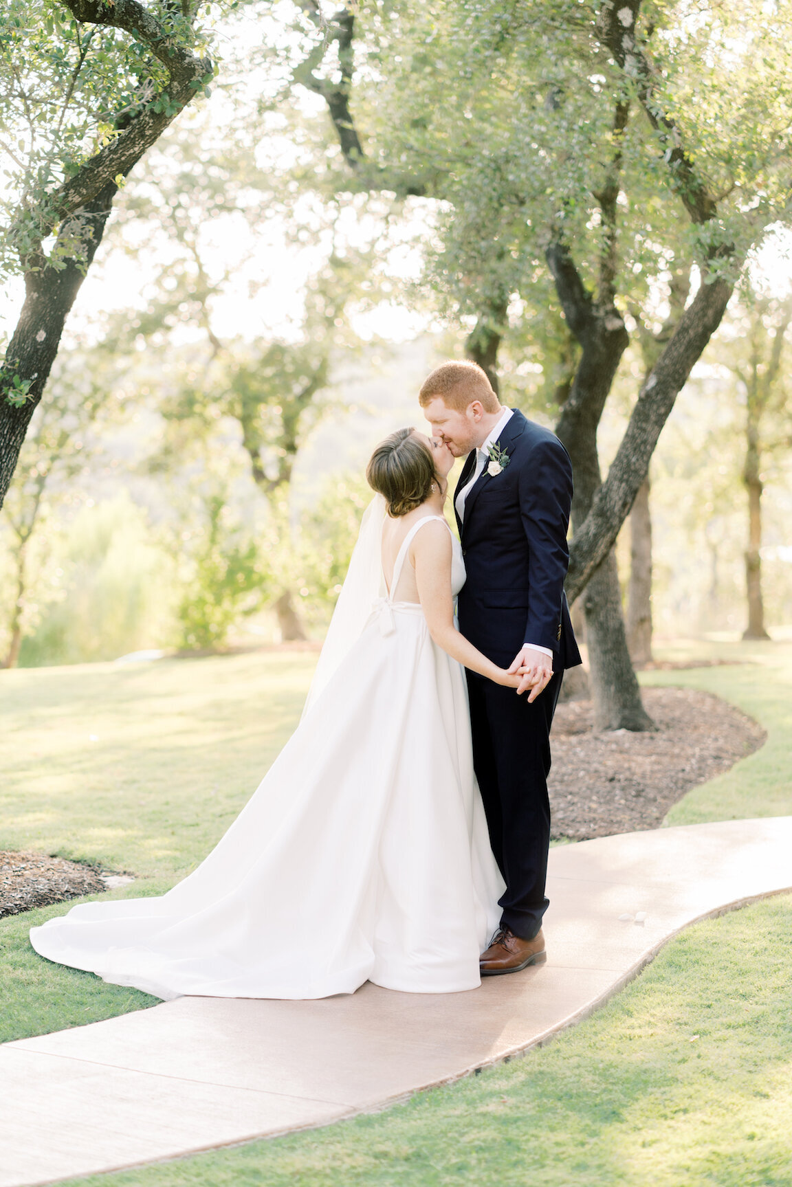 Canyonwood Ridge wedding venue with sweeping Hill Country views and oak trees