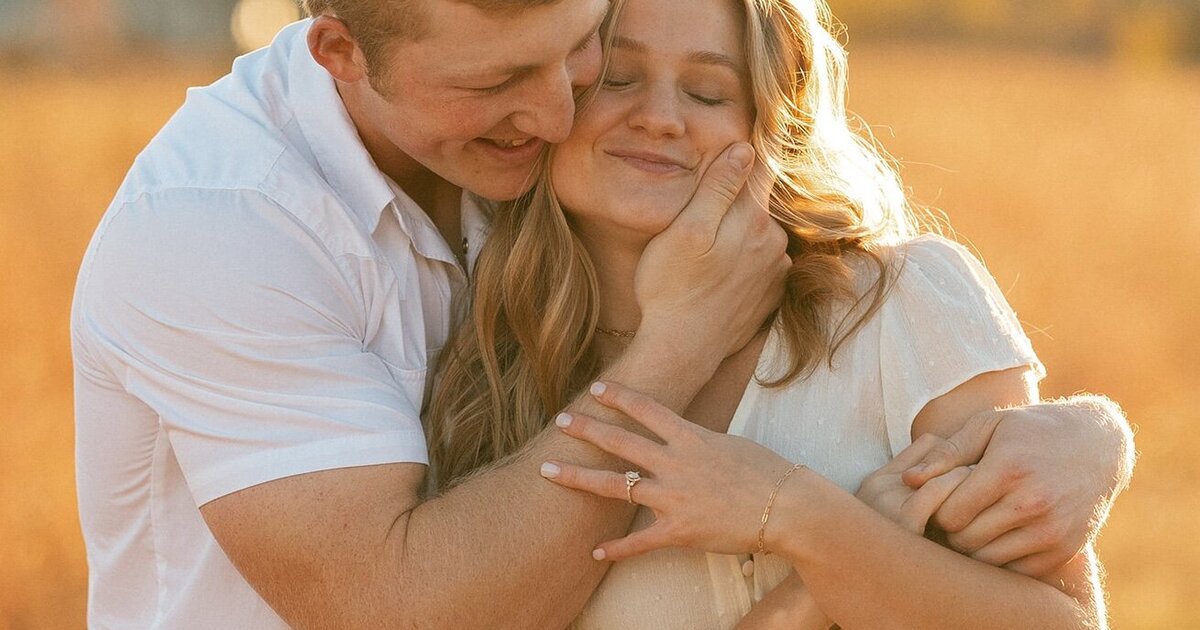 cute-engaged-couple-golden-fields-kate-torline-photography-kansas-city