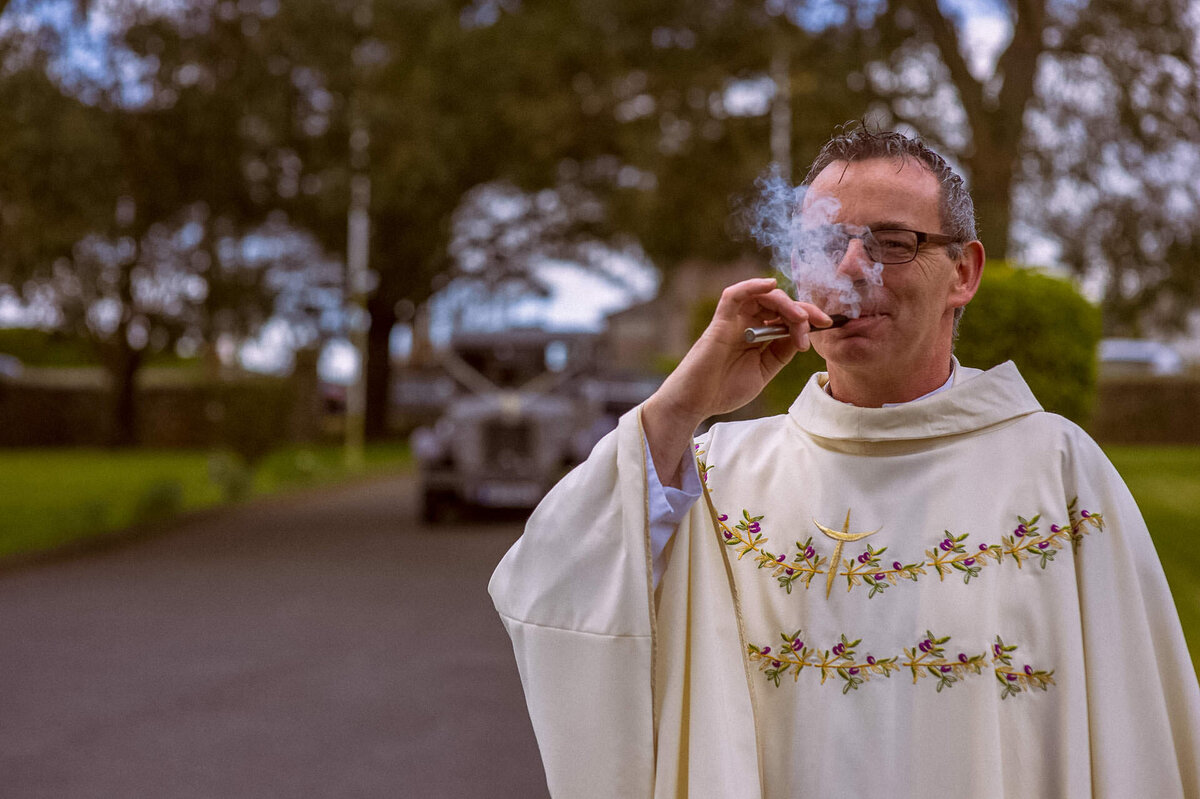 149 smoking-priest-at-crooke-wedding