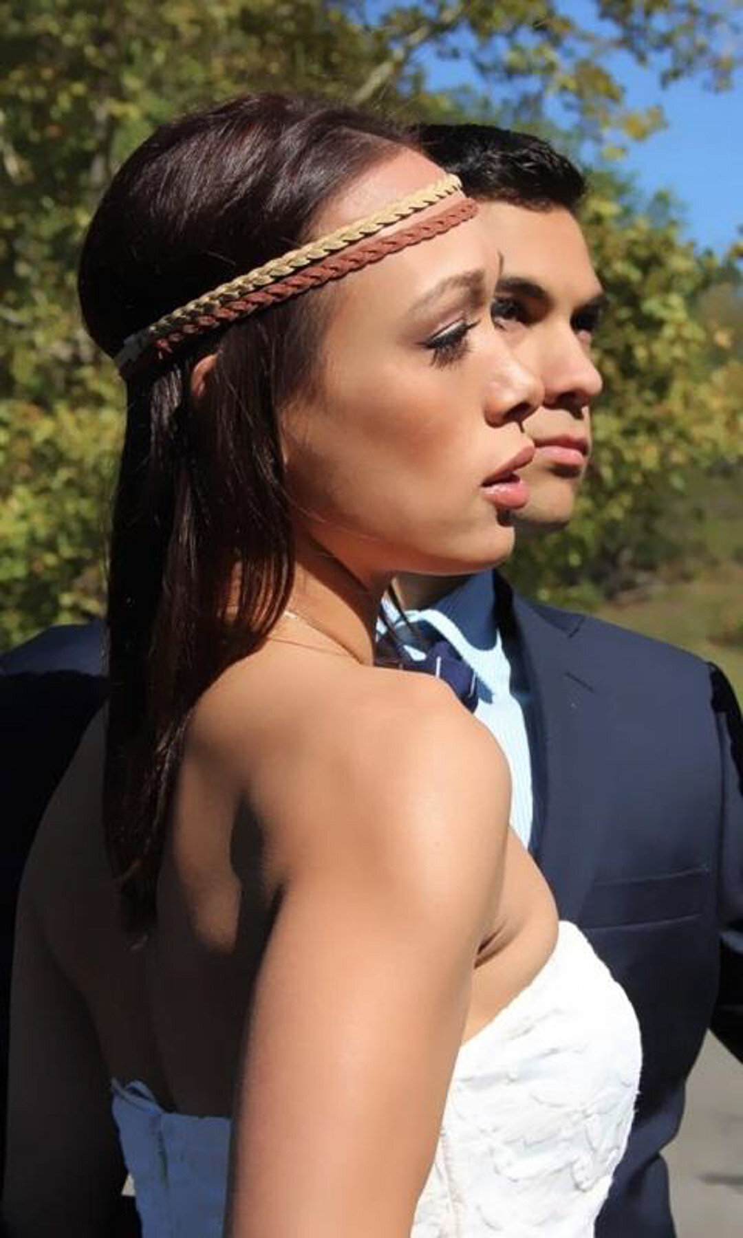 First look moment with bride’s subtle smoky eye and pink-toned lipstick – makeup by Lyds Makeup.