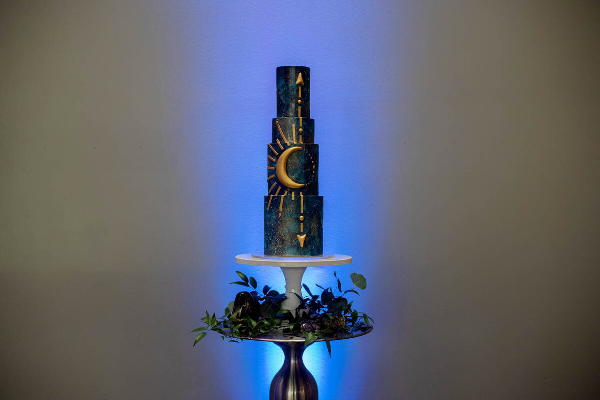 a huge hand crafted and painted celestial wedding cake by sewell sweets