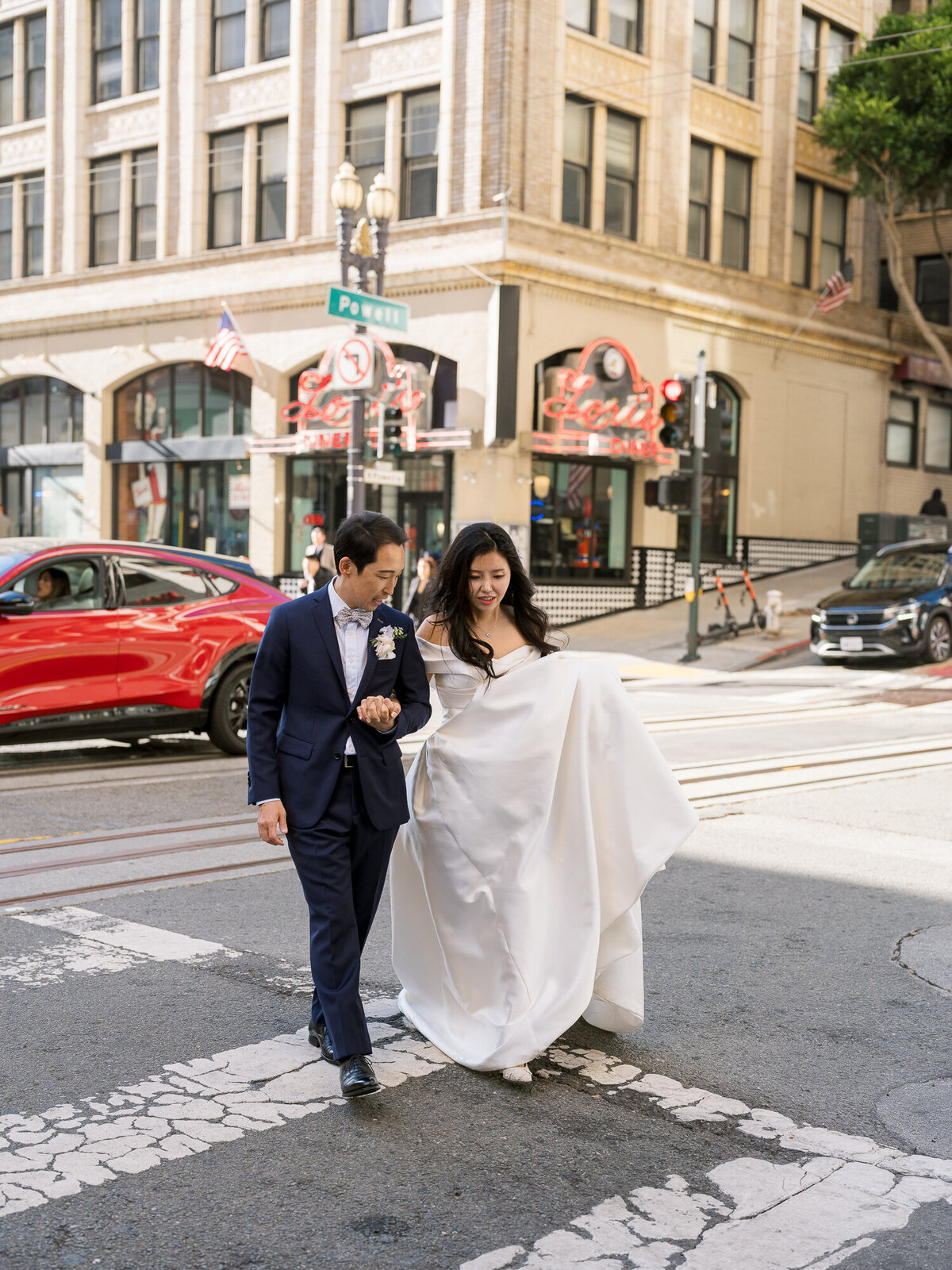 Wedding couple street portraits downtown San Francisco Bay Area wedding photographer golden hour
