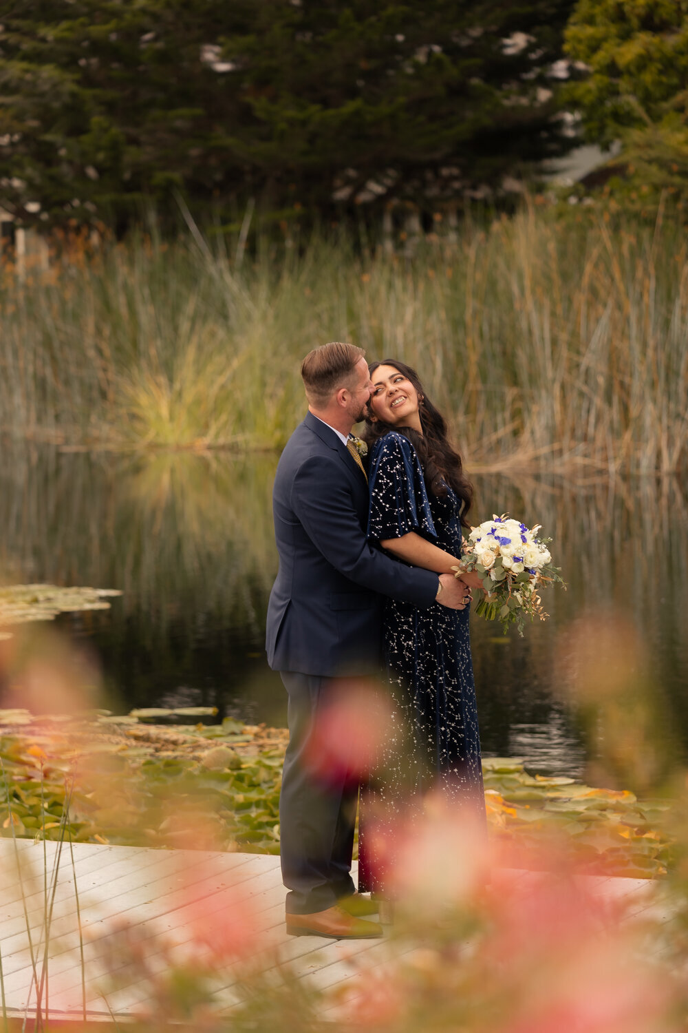 Central Coast Cypress Ridge Pavilion Wedding candid couples sunset photos on dock with pond