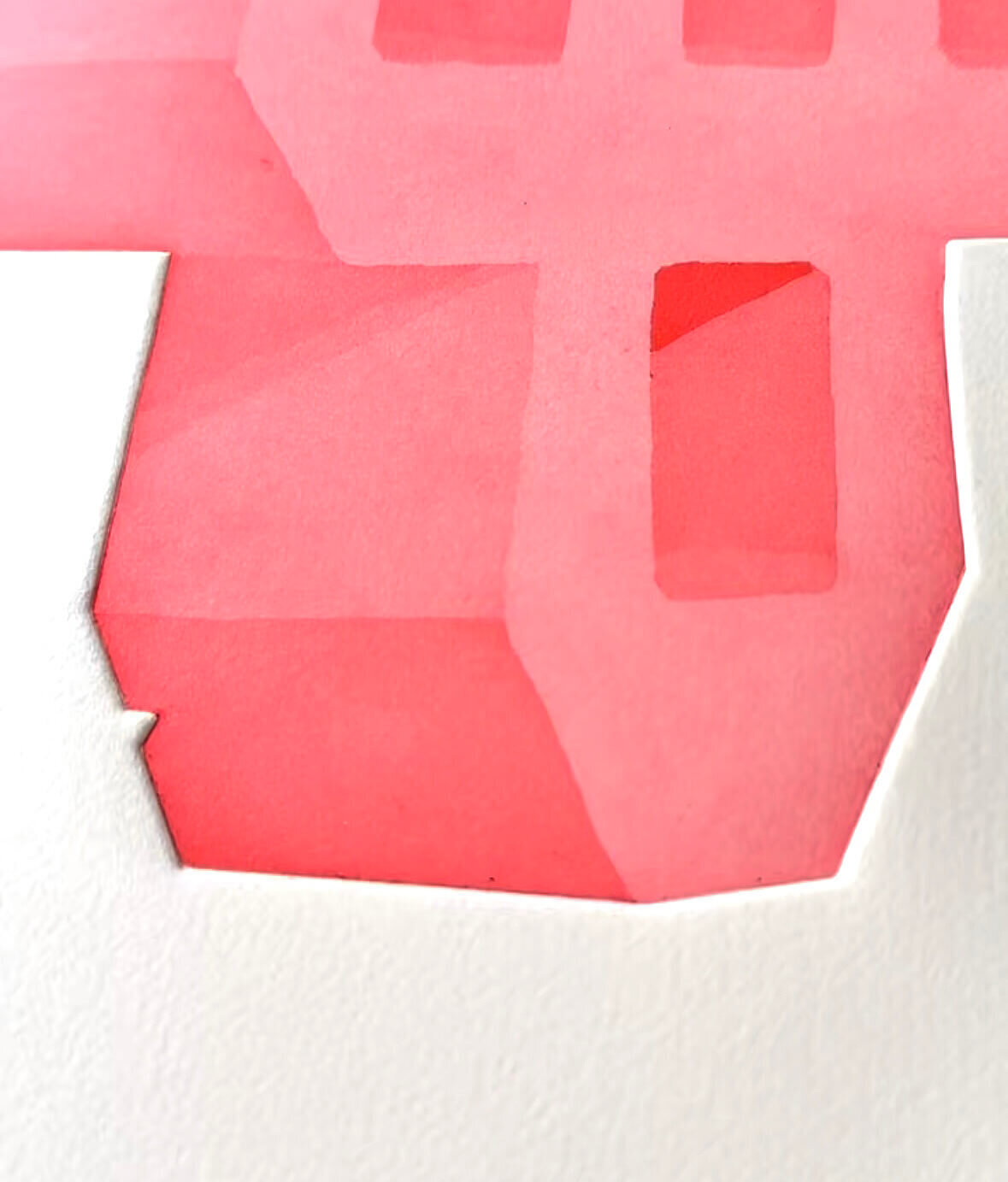 A close-up of a red drypoint print with sharp edges and smooth gradients, highlighting the crisp cut of the paper.