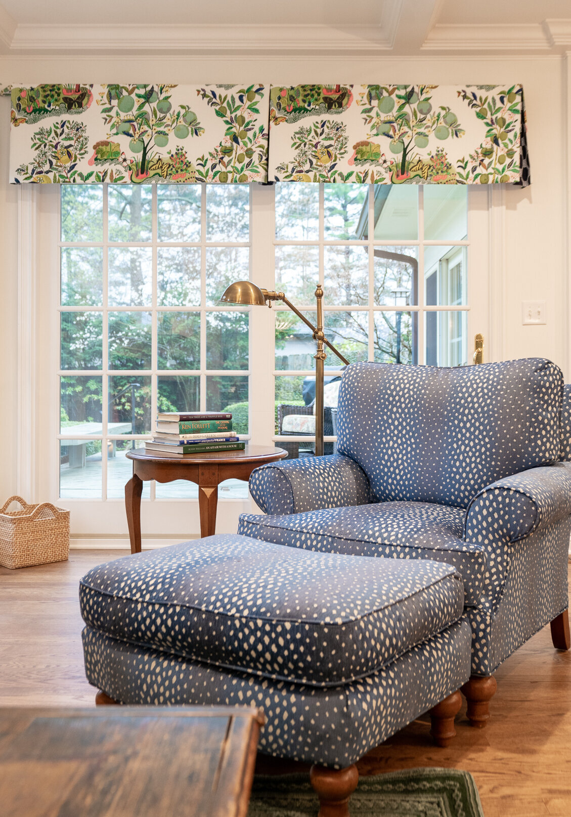 oversized chair and ottoman with a blue and white pattern