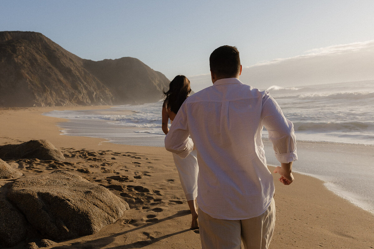 Joyful Coastal Run - San Francisco Engagement Photographer
