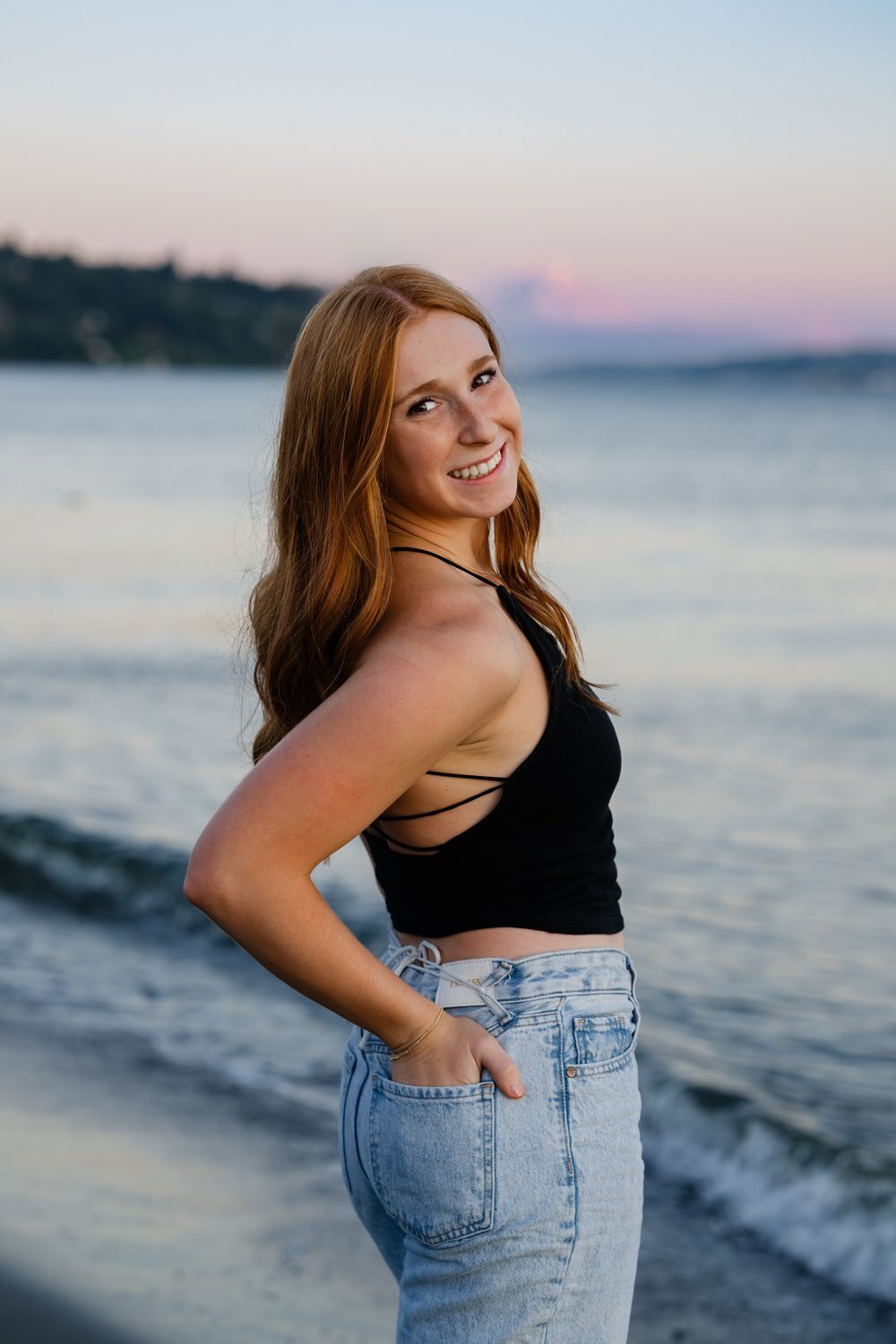 issaquah senior on puget sound beach at sunset
