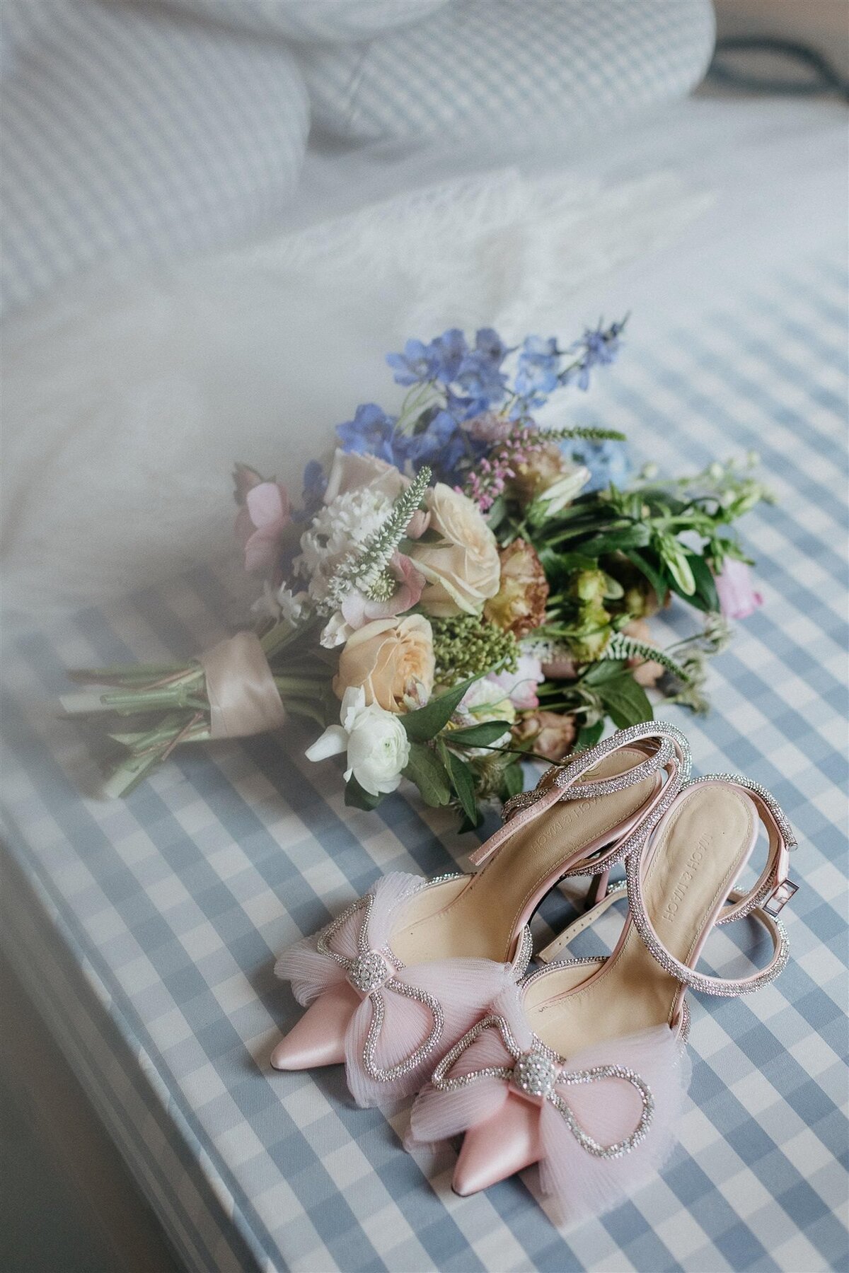 Details of shoes and flowers.