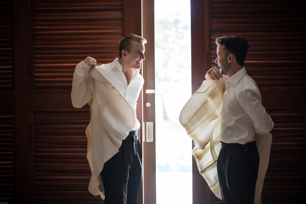 Two grooms get ready  at a destination wedding in Puerto Rico