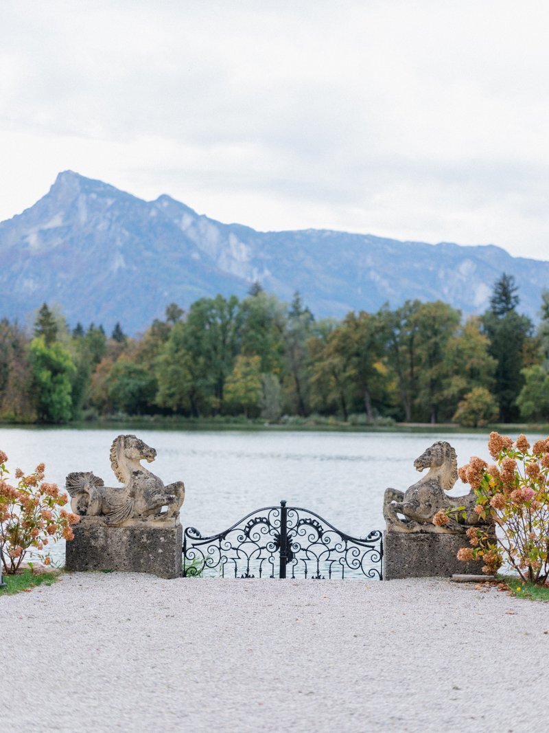 Gate with its famous sea horses at destination wedding venue Leopoldskron Salzburg