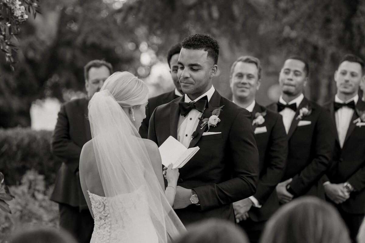 bride reading her vows during ceremony