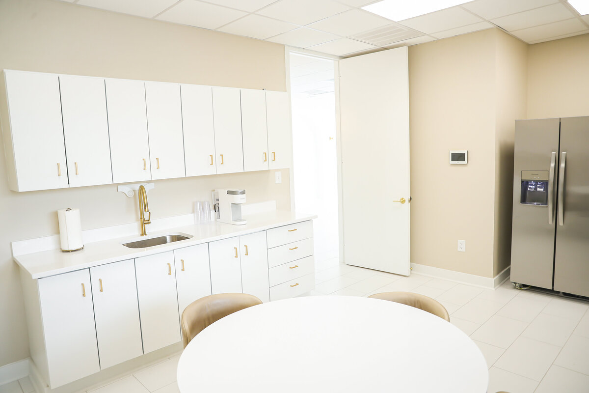 Table and cabinets in break room