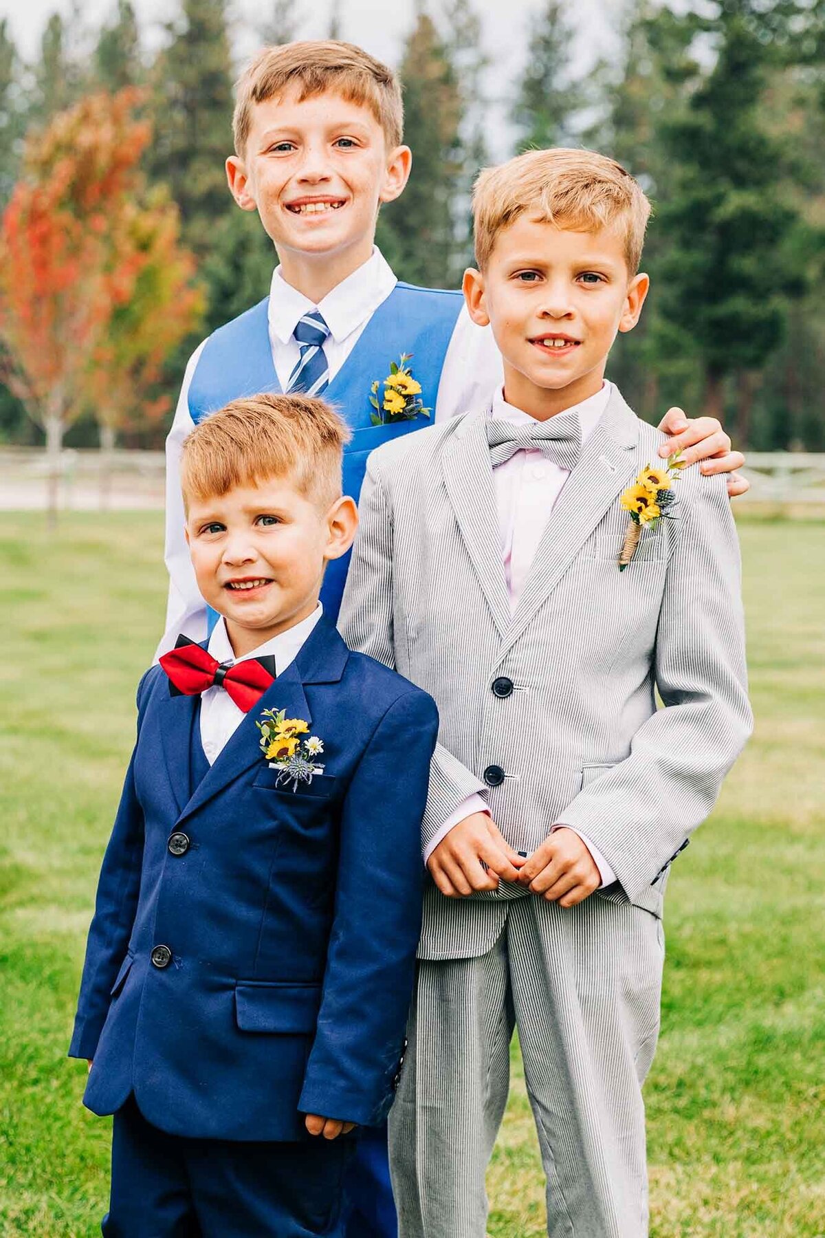 Three young boys dressed up in suits at The Silver Knot, Ronan, MT