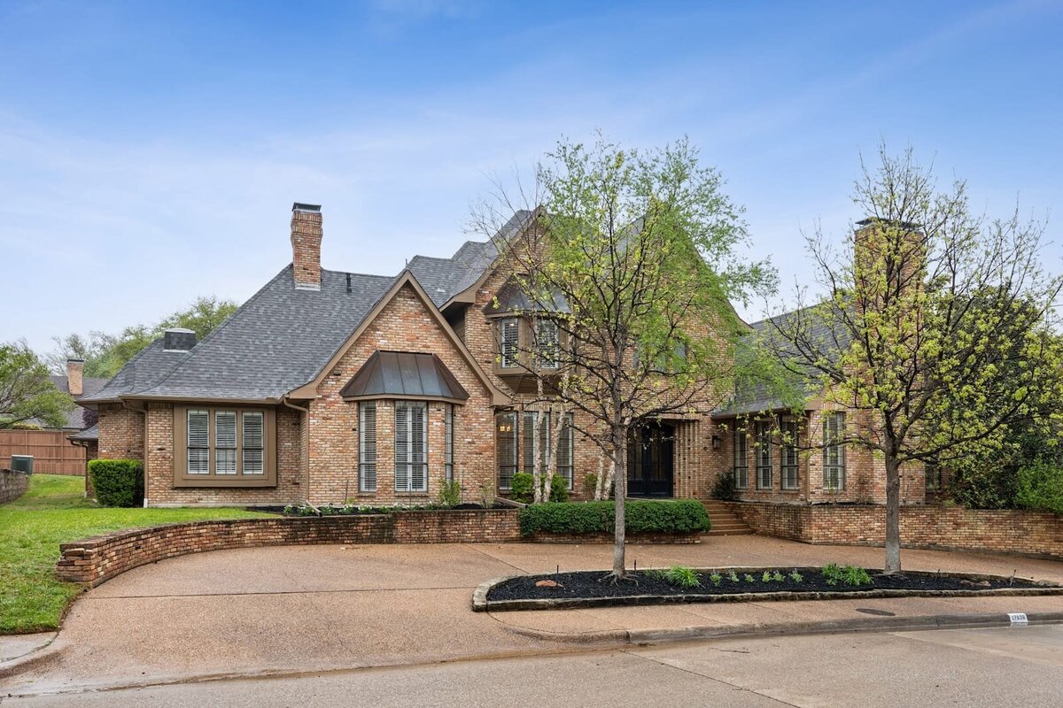17828_cedar_creek_canyon_dr_dallas_tx_front_angle_view_-_brick_facade_architecture_on_corner_lot_-_haven_realty_group