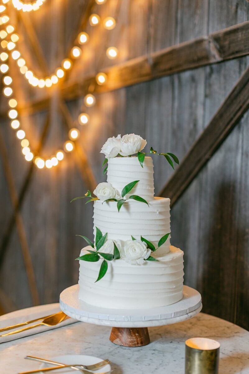 all white wedding cake at terrain gardens