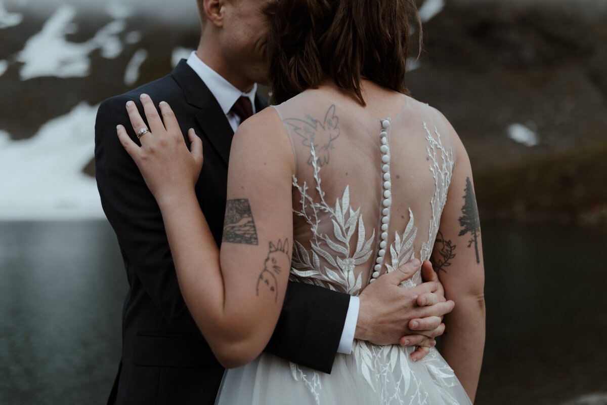 bride and groom embracing