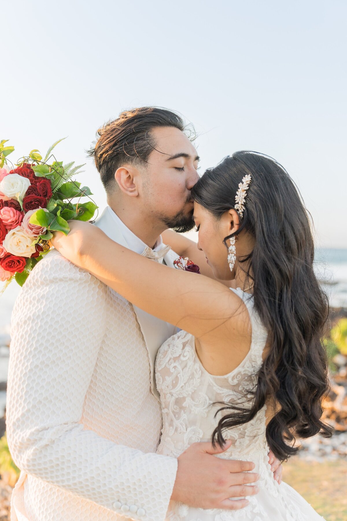 Sweet embrace after “I do” by Big Island team