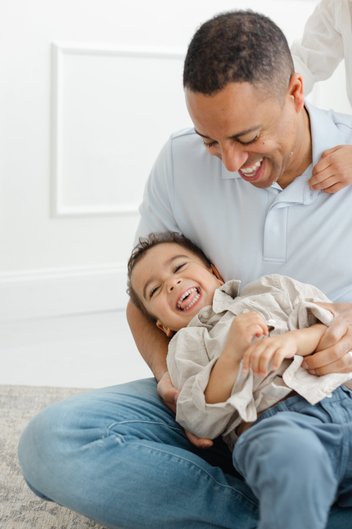 Newborn photography session with siblings at a Philadelphia photography studio - 16