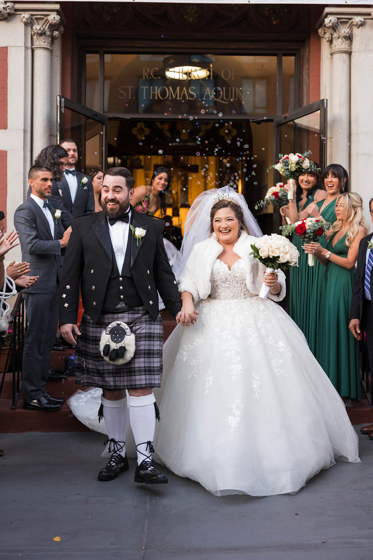 Joyful Bridal party exit from church.