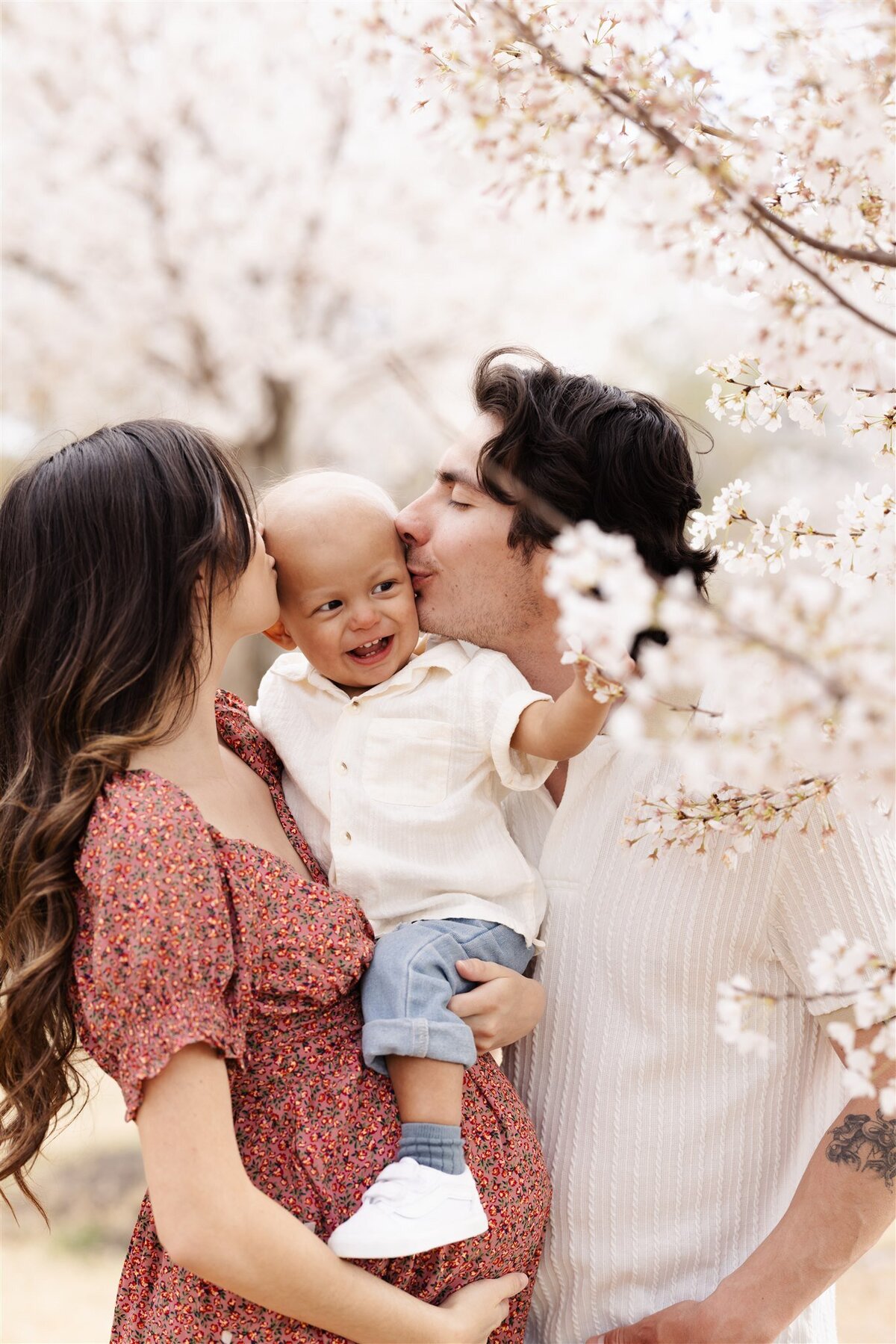romantic couple kissing engagement session neutral tones