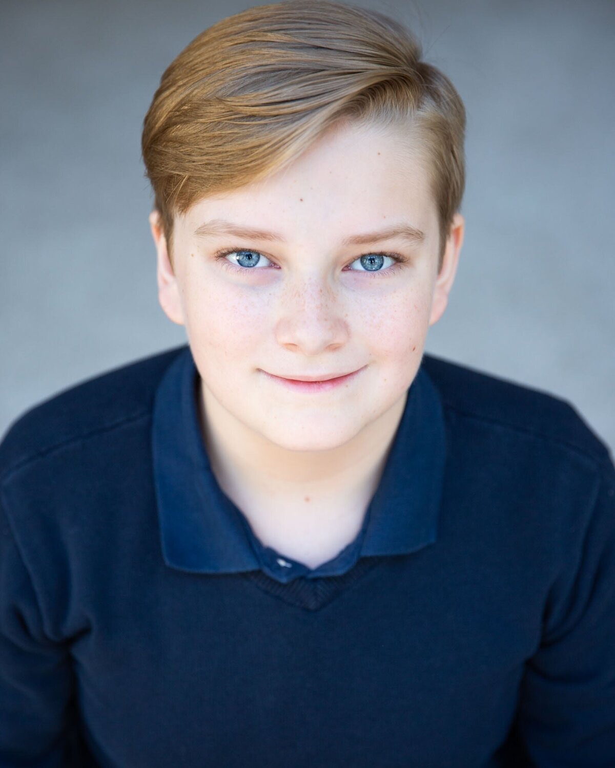 Headshot for this actor in blue in Peachtree City Georgia