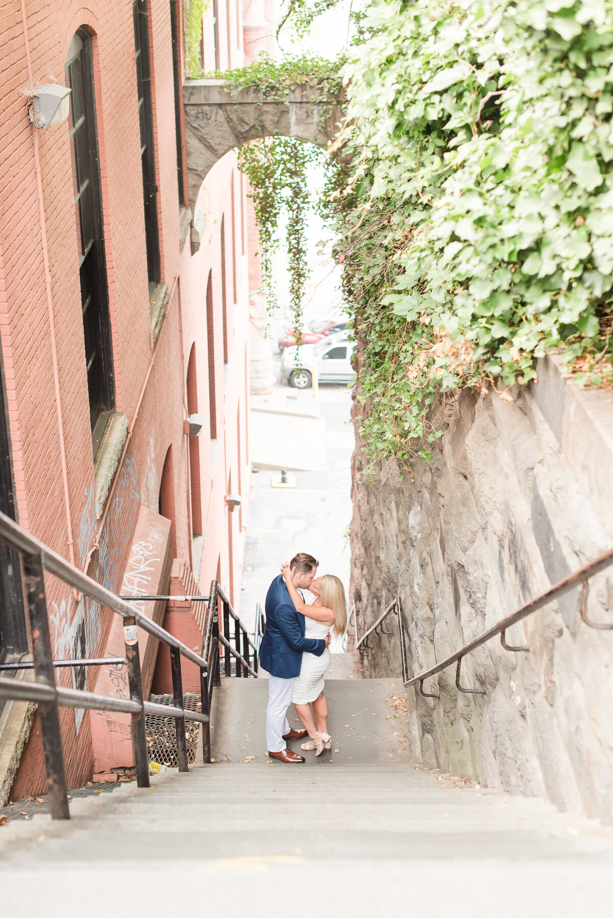 exorcist stair engagement photo couple kissing