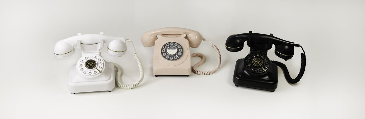 White pink and black retro phones