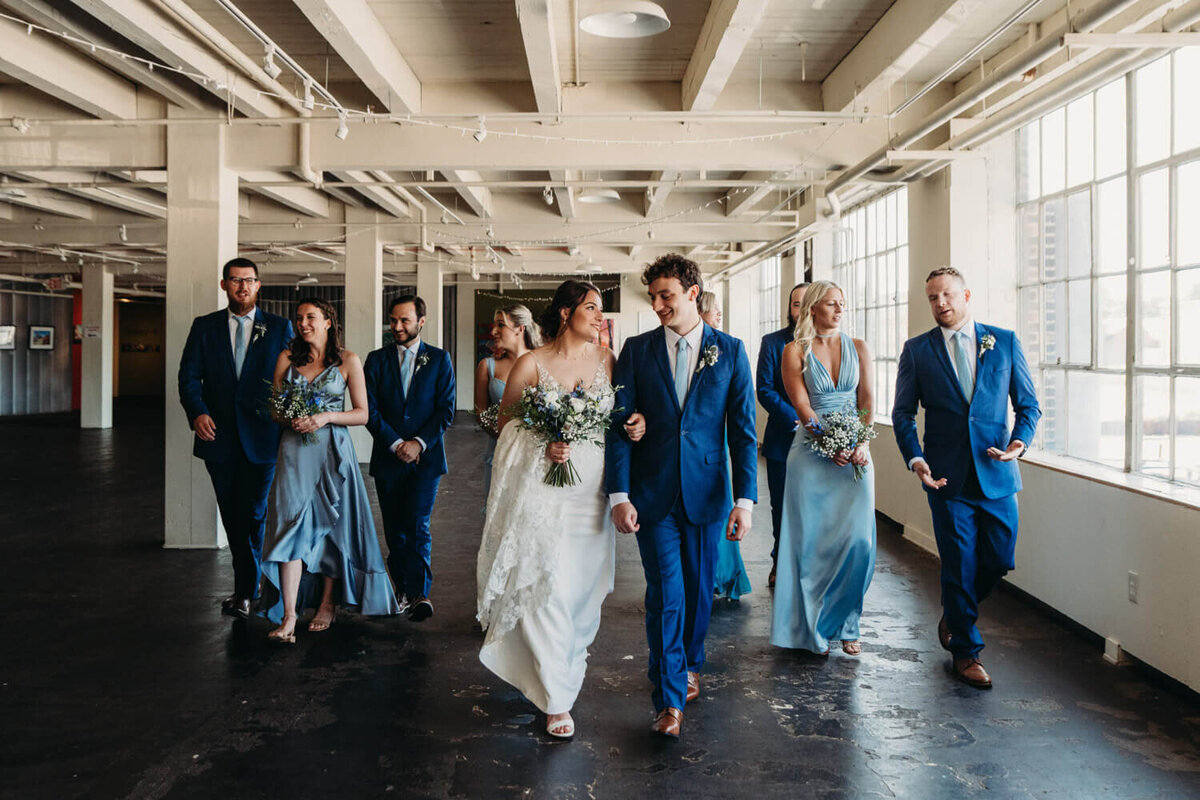 Bridal party walks in 78th st Art Studio