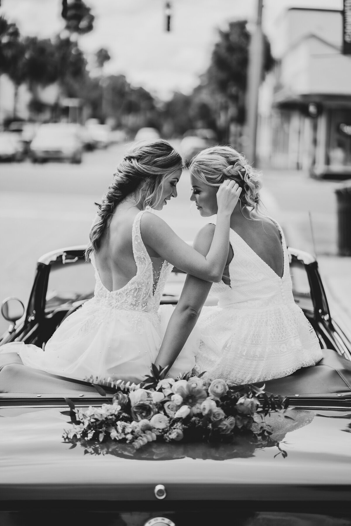 bride and bride in convertible