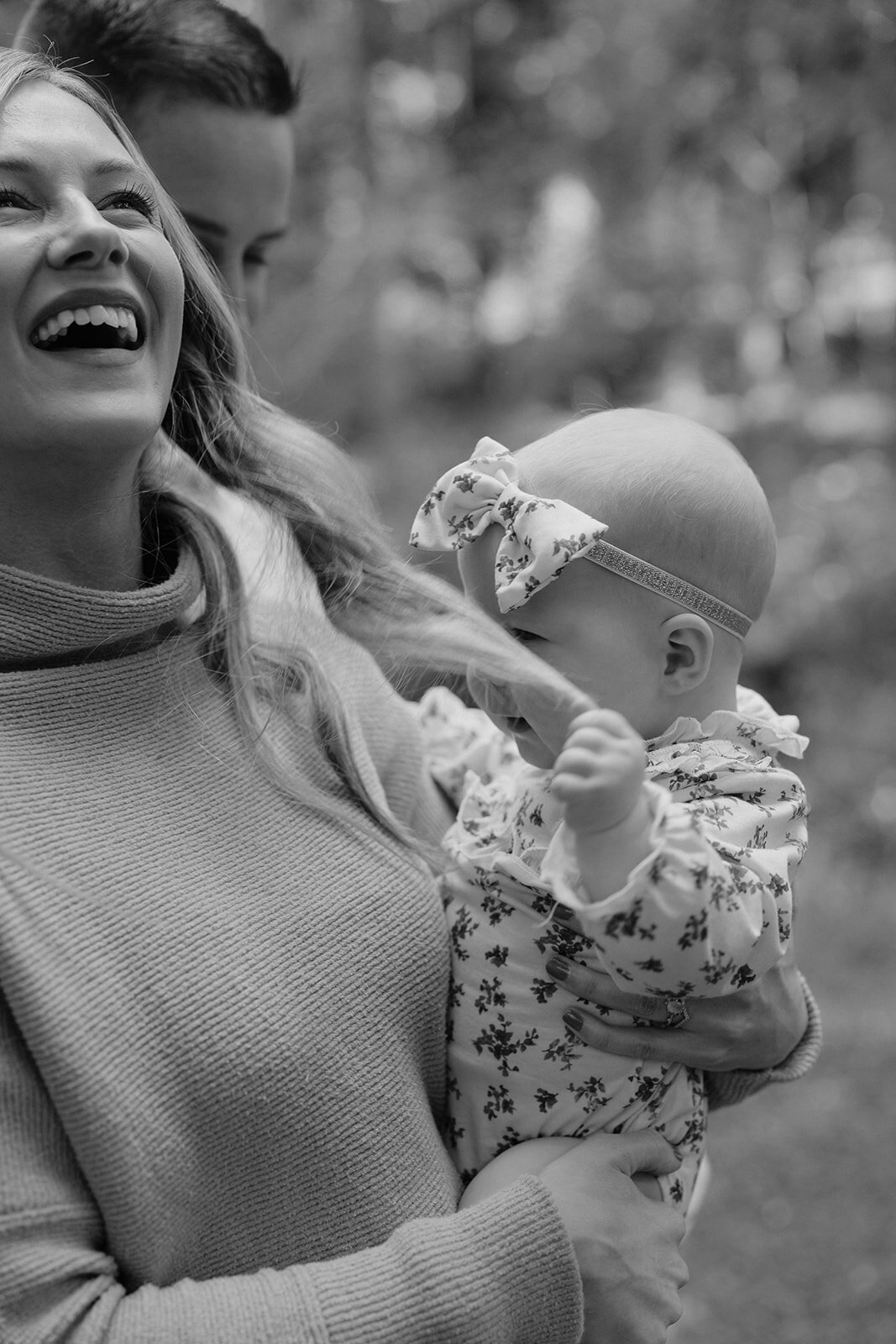 Mom and daughter posing at Midlothian greenhouse during their spring mini session with Three Bridge Photography