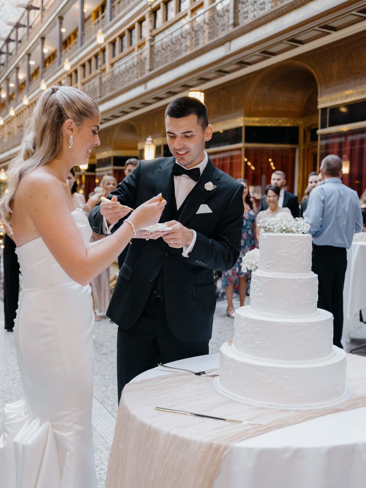 Couple having their wedding cake at The Arcade Cleveland