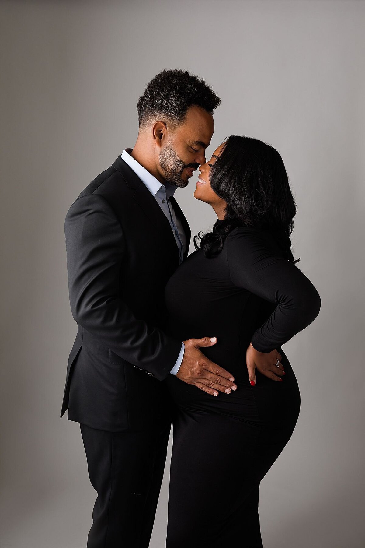 black dress maternity studio photos