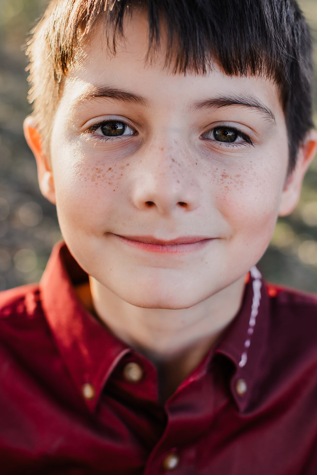 Brother smiling with his sweet eyes.